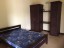 master bedroom with closet and...